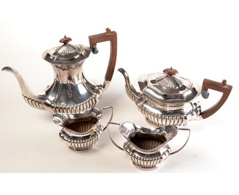 A half fluted, four piece EPNS tea service by Cheltenham, Sheffield.