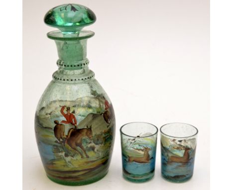 A soda glass decanter in Georgian style, enamelled with a hunting scene, together with a pair of matching small tumblers. 