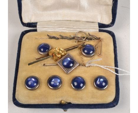 A silver dress set and a 14ct. gold tie pin.