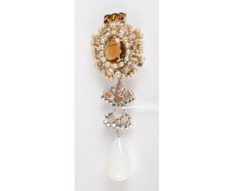 A Christian Dior brooch. Condition Report: There are 7 missing pearls.
