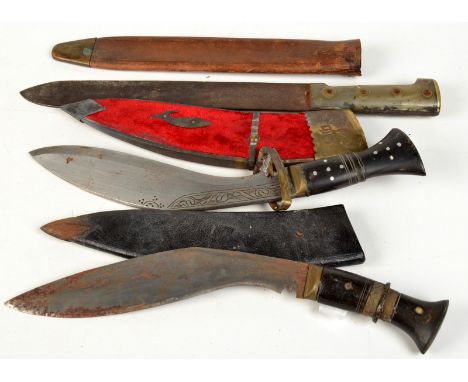 A machete with a horn handle and a leather sheath and two kukris.