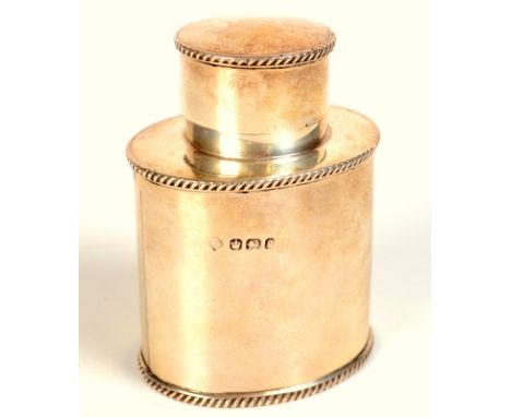 A Victorian silver oval tea caddy of simple design with rope twist rims, by Martin, Hall & Co., Sheffield, 1897, 3ozs.