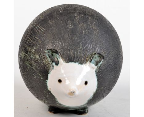 A large Briglin Pottery hedgehog. Condition Report: Diameter 65cm, length 28cm and height 23cm (all approx.)
