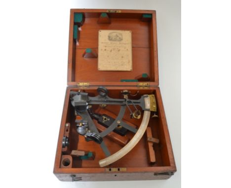 A late 19th to early 20th century sextant with a brass and silvered scale and rosewood handle in a fitted hardwood case, by G