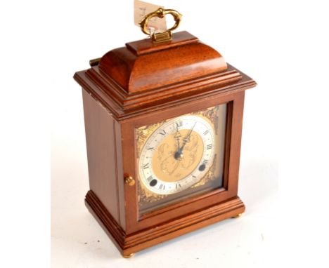 An Elliott bracket clock retailed by Vage, Truro.