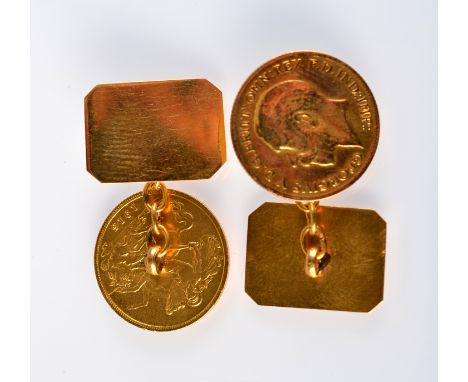 A pair of gold half sovereign cufflinks.  Each dated 1915.  13.5gm.