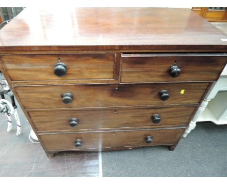 A 19th century mahogany chest of two short and three long drawers on bracket feetMarked, tired. Veneer missing, damage to leg