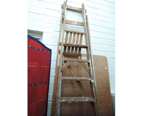 A set of large wooden step ladders A/F