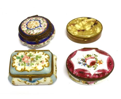THREE PAINTED PATCH BOXES  with floral decoration and an oval gilt metal box with mirrored interior (4)