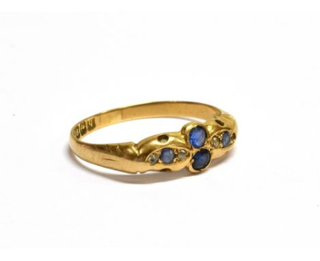 AN 18CT GOLD, SAPPHIRE AND ROSE DIAMOND GYPSY RING the tapering head designed as a cross and set with four small round mixed-