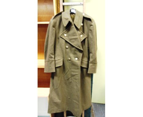 MILITARIA - A BRITISH ARMY GREATCOAT  post Second World War, with Royal Army Education Corps staybrite buttons. 
