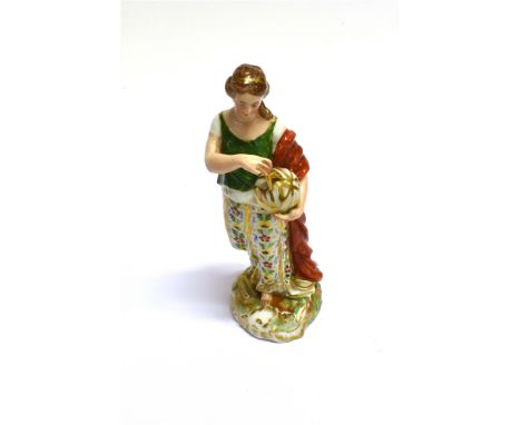 A DERBY FIGURE OF A CLASSICAL FEMALE  standing holding globe and compass, red painted marks to base, 20cm high