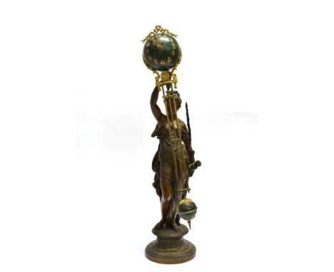 A LARGE PATINATED SPELTER FIGURAL MYSTERY CLOCK  modelled as Diana the huntress, 75cm high overall