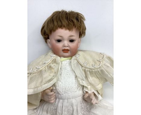   Antique German Fine German Kley and Hahn character boy  baby with closed mouth c 12” , bisque head with original glass dark