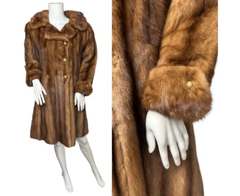 A vintage 1960s stranded mink jacket by Walshes of Sheffield with mushroom satin lining, turn back cuffs, rear vent and featu