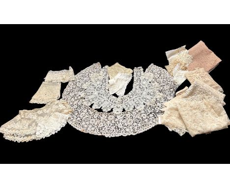 A group of antique lace collars, bonnet veils etc to include a large brussels lace collar, a single Honiton lace cuff, a guip
