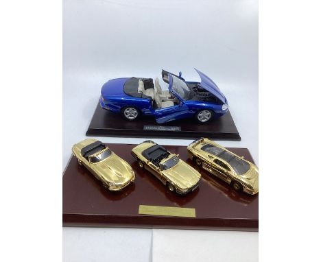 Vintage die cast Fine Jaguar Model Interest ;Maisto 3 gold 22ct plated jaguar toy die cast cars on a plynth with certificate 