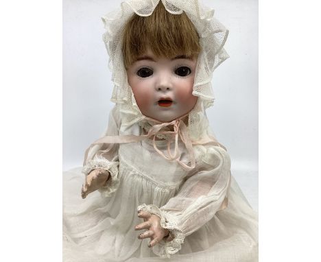 *  Antique 1295 Simon and Halbig for Franz Schmidt and Co c 1923 bisque head doll.c14” tall with character bent limb body. Op