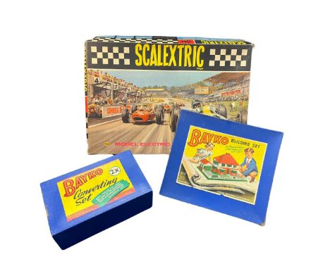 A collection of vintage childhood favourite toys to include a 1960's Triang Scalextric Set 50 (untested and as seen) with ins