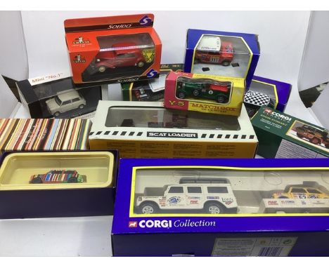 Vintage diecast boxed cars to include a Paul Smith True Brit mini car, further corgi and other mini cars , inc a Mini white n