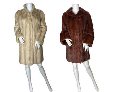 A vintage pearl cross mink coat, the lining having the Sefton Marks logo. Narrow roll collar and furrier clips to fasten, L, 