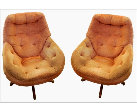 Pair of 1970's Vono swivel and tilt armchairs, having button back and seat, in rust dralon, on stained wood swivel base (reup