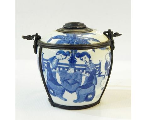 Chinese porcelain and bronze mounted oil lamp of shouldered oval shape and painted in underglaze blue with figures in a garde