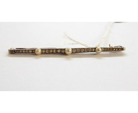 19th century diamond and pearl bar brooch, the central pearl flanked by six graduated brilliant cut diamonds, two smaller pea
