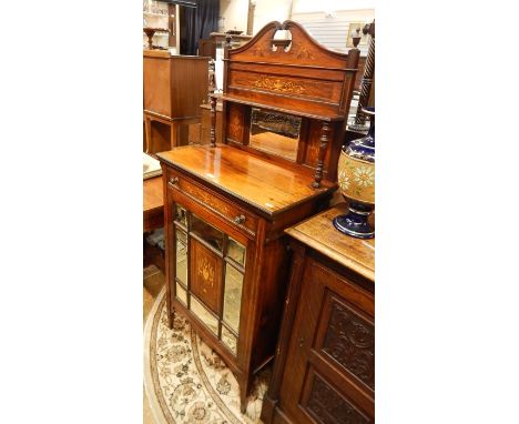 Edwardian inlaid rosewood music cabinet, the raised back with swan neck pediment, small shelf, on turned supports, all inlaid