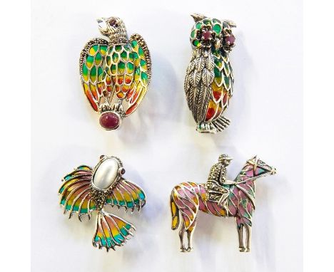 Four silver, marcasite and plique a jour pendants to include fish with pearl body, eagle, horse and jockey, some set with sem