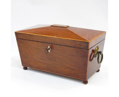 Inlaid Georgian mahogany tea caddy, sarcophagus-shaped with line inlay to the borders, brass ring side handles, the interior 