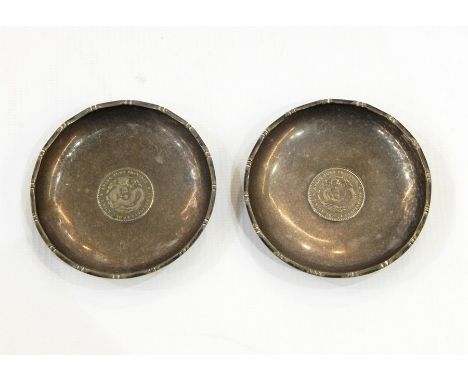 Pair Chinese silver coin inset trinket dishes, marked 'Sterling Silver, made in Hong Kong', 7.5cm diameter Re: Enquiry - Toys