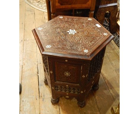 Anglo-Indian mother-of-pearl inlaid stained hardwood occasional table, hexagonal, allover scroll carved and with mother-of-pe