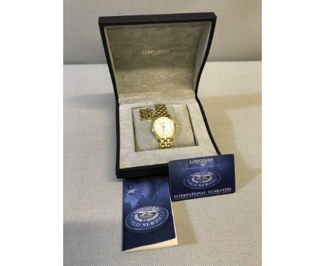 18ct gold Men's Longines automatic watch &amp; 18ct gold strap. Complete with manual, card of purchase &amp; original box, 10