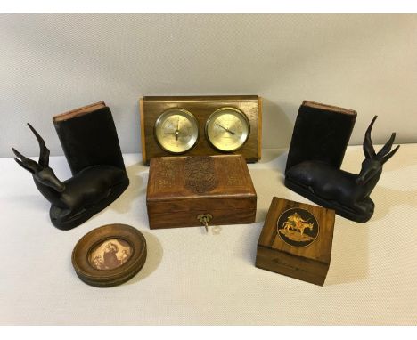 Barometer/ Thermometer set, Antelope hardwood bookends, Antique rosewood inlaid box, Indian brass inlaid jewel box and oak ro