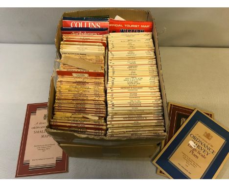 A Box full of old ordnance survey maps 