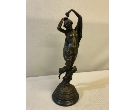 Bronze nude lady figure on marble/ granite base. Measures 38cm in height 