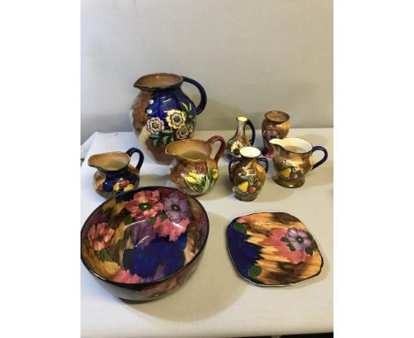 A Collection of H & K Tunstall hand painted flower design jugs, bowl and vases 