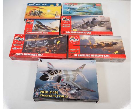 A group of 1:72 scale unbuilt plastic kits by various manufacturers including  AIRFIX, ITALERI and others, all Military aircr
