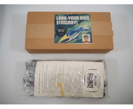 A very scarce AIRFIX Gerry Anderson Stingray unbuilt plastic kit -originally available through LYONS MAID as an ice cream pro