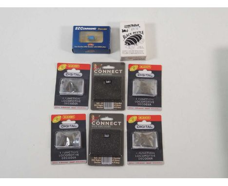 A group of multi-gauge DCC digital decoders by HORNBY, DCC CONCEPTS (for Rails) and BACHMANN together with a OO gauge BLACK B