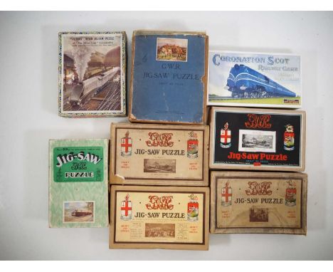 A quantity of mostly pre-war jigsaw puzzles by CHAD VALLEY and VICTORY for the Great Western Railway and others - all relatin