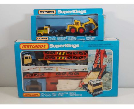 A MATCHBOX vintage diecast Super Kings K-44 Bridge Layer set (appears complete and unused) together with a K-108 Digger & Plo
