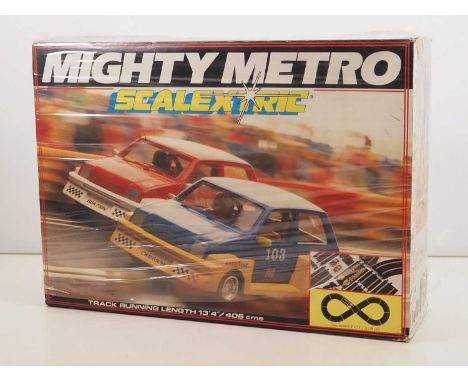 A SCALEXTRIC C880 'Mighty Metro' racing set, still with factory shrink wrap present, appears unused - VG/E in G/VG box