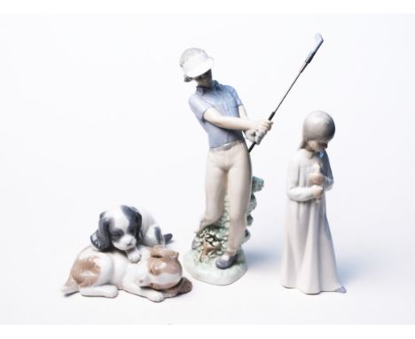 A group of three Nao figures