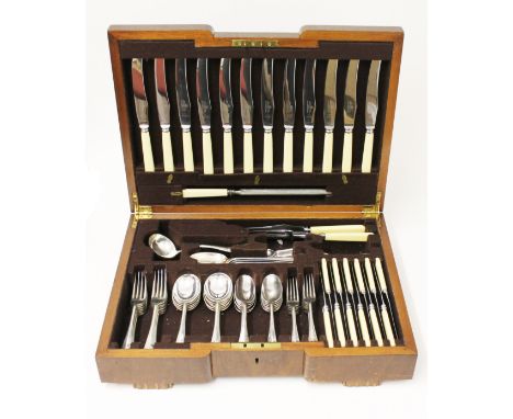 An Art Deco walnut canteen of silver and stainless steel cutlery. Harrison Bros and Howson. Sheffield 1958. Wt. (excluding st