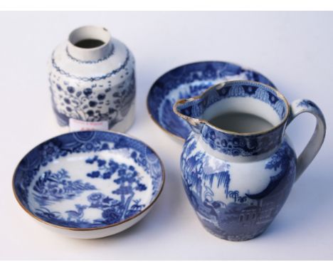 An 18th cenetury blue and white tea caddy, two blue and white bowls and a cream jug