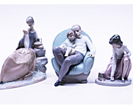A group of three Nao figures
