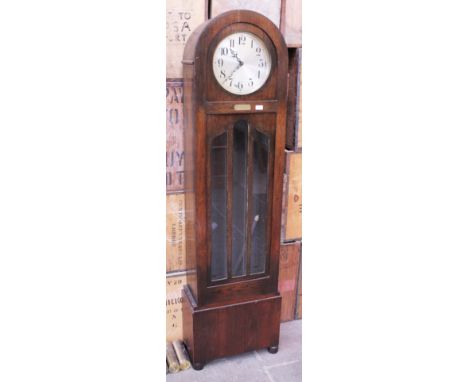 A 1930s domed longcase clock