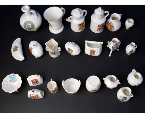 Twenty five pieces of W.H. Goss crested china